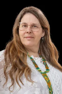A headshot of Angela Mae Love. A teacher at Pachama Sanctuary.