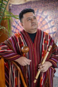 A headshot of Juan Carlos Arkawa. A teacher at Pachama Sanctuary.